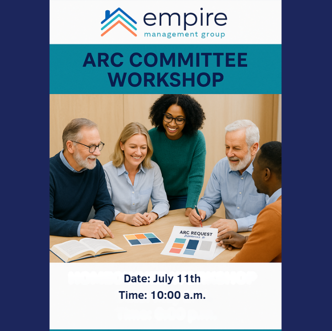 A diverse group of smiling adults sits around a table discussing color samples during an ARC Committee Workshop hosted by Empire Management Group.